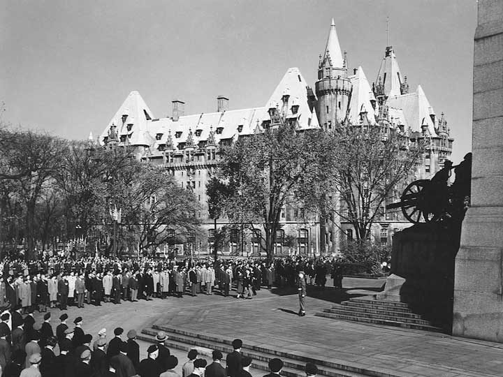 Princess Elizabeth and the Duke of Edinburgh review an honour guard of Veterans at the Naitonal War Memorial during the 1951 coast-to-coast Royal Tour of Canada