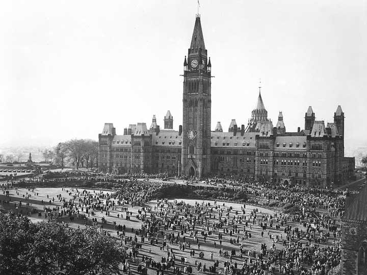 Crowds gather around the Parliament Building to see Princess Elizabeth and the Duke of Edinburgh during the 1951 coast-to-coast Royal Tour of Canada