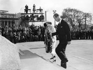 Queen Elizabeth II and Prince Philip laying a wreath at the National War Memorial during their visit to Ottawa to open the 23rd Parliament of Canada