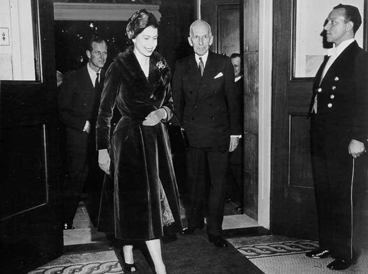 Queen Elizabeth followed by Prince Philip, enters the House of Parliament during the Royal Visit in 1957