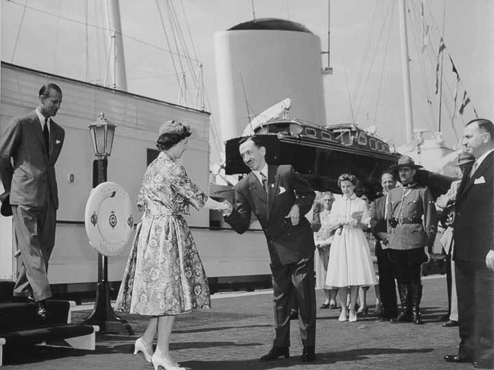 Queen Elizabeth and Prince Philip are greeted as they disembark from the HM Yacht Britannia during the 1959 Royal Tour of Canada