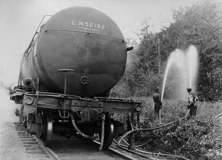 A firefighting tank car in use