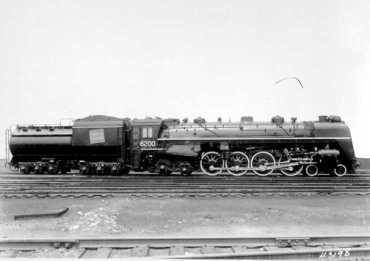 Broadside view of steam locomotive #6200
