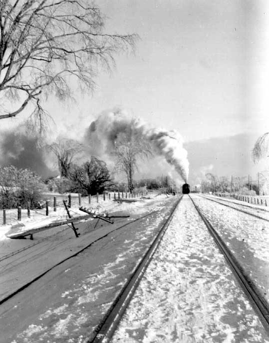 Telegraph pole, left, damaged by winter storm