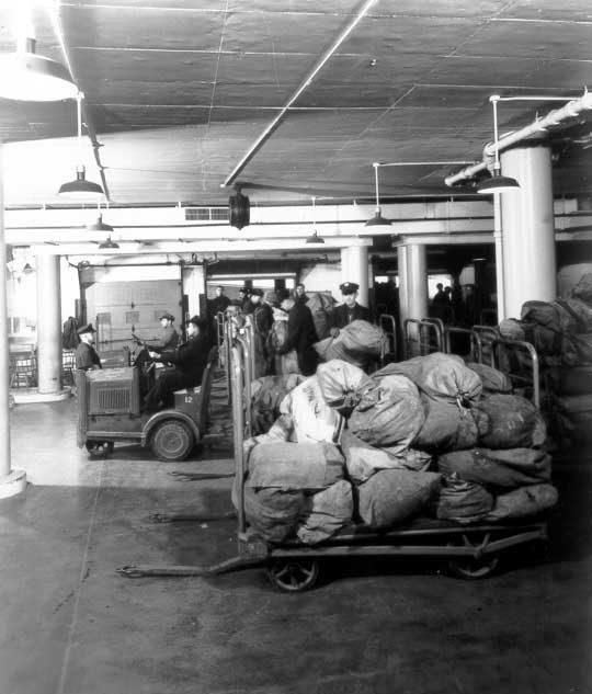 Handling bags of mail at Montreal's Central Station
