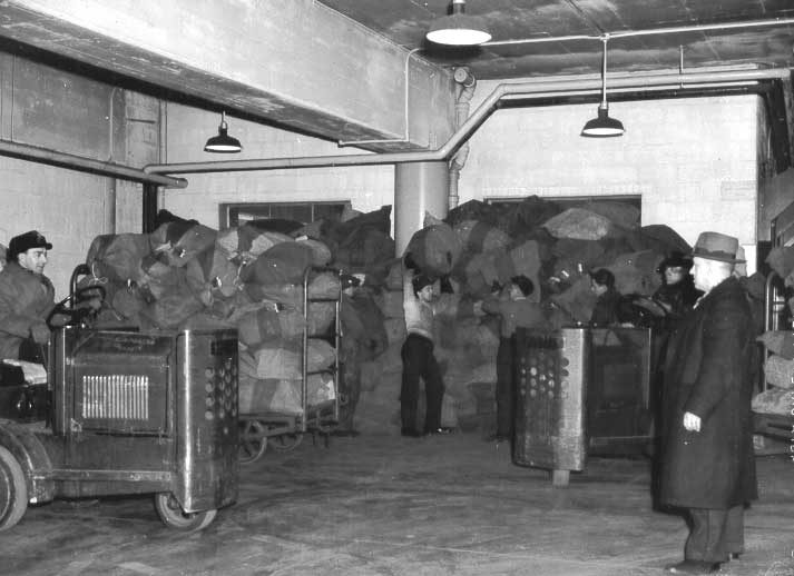 Central Station employees sorting shipments of Christmas mail