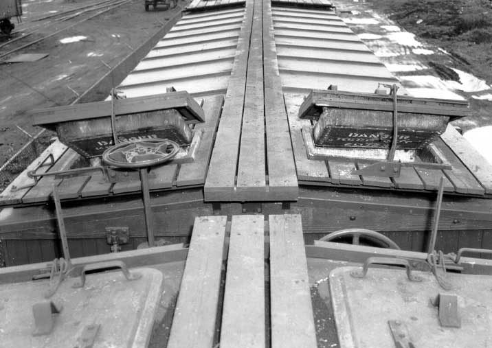 Top view of refrigerator car with hatches opened to receive blocks of ice.