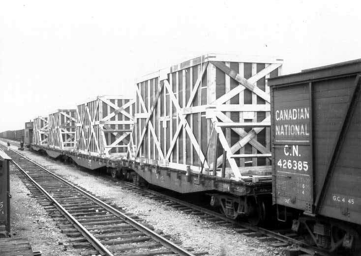 Crates of refabricated aluminum houses enroute to Kingston, Ontario