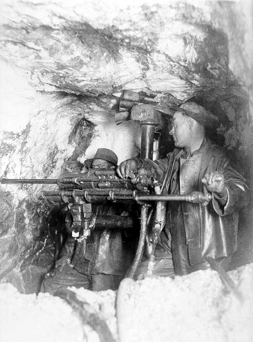 Miners drilling at 1000 feet, Coniaurum Mine