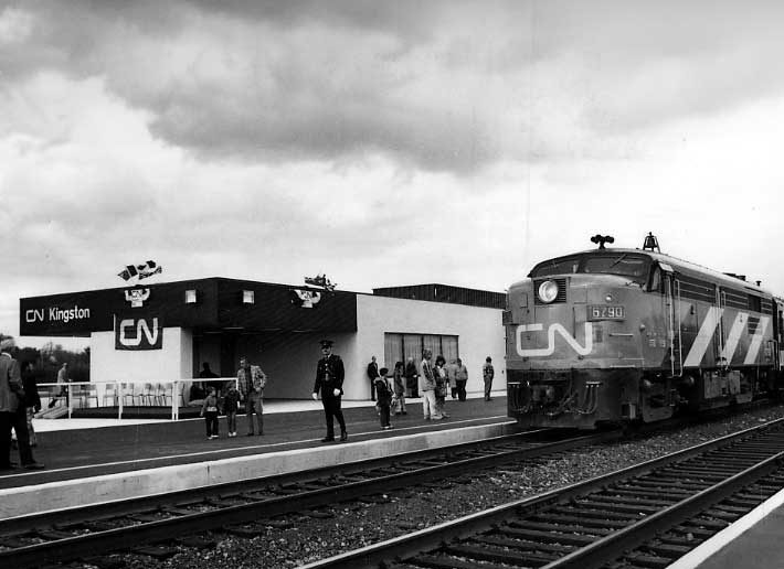 Spectators and passengers at the official opening of Kingston Station