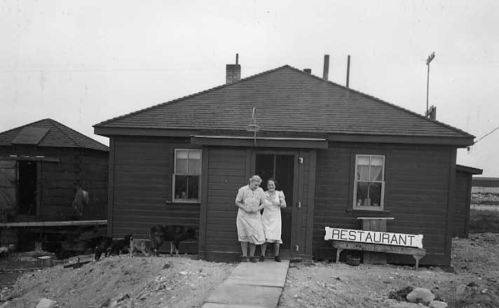 Mrs. M. Ostrom and Mrs. S.E. Hood; in charge of the CNR restaurant  (U.S. Army and Airforce base?)