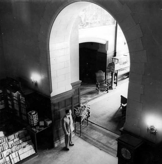 Standing in the archway of the MacDonald Hotel lobby