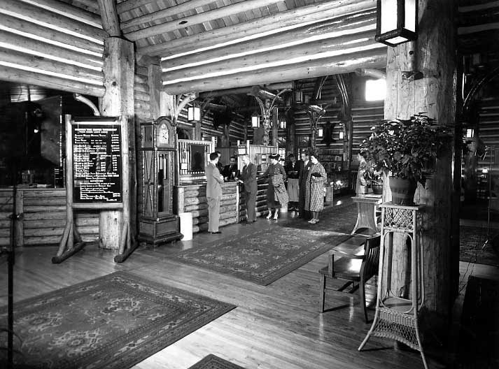 Guests registering at the front desk, Jasper Park Lodge