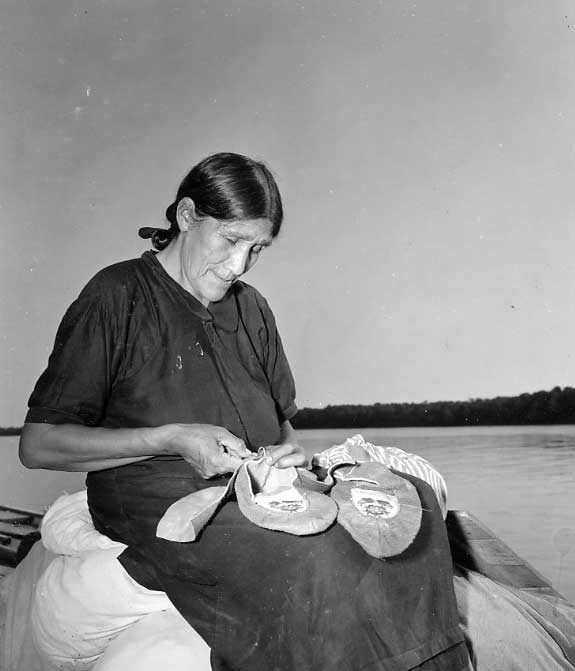 Aboriginal Moccasin Maker on the shores of Hudson Bay