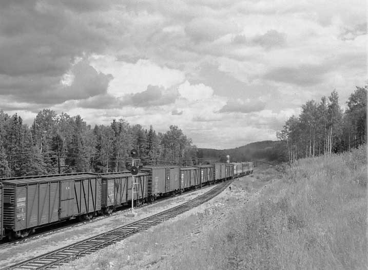 Centralized Traffic Control signals with a freight train.
