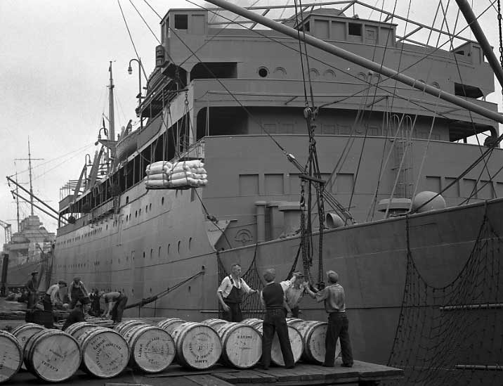 Loading supplies on the SS Lady Hawkins, docked in Halifax