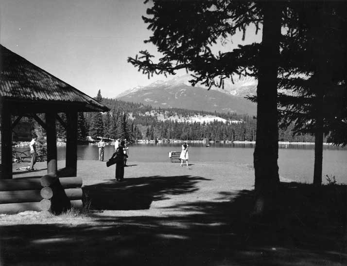 Golfers at the 14th tee of the Jasper Park Lodge golf course