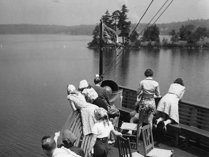 Passengers on a boat cruise at Muskoka Lakes