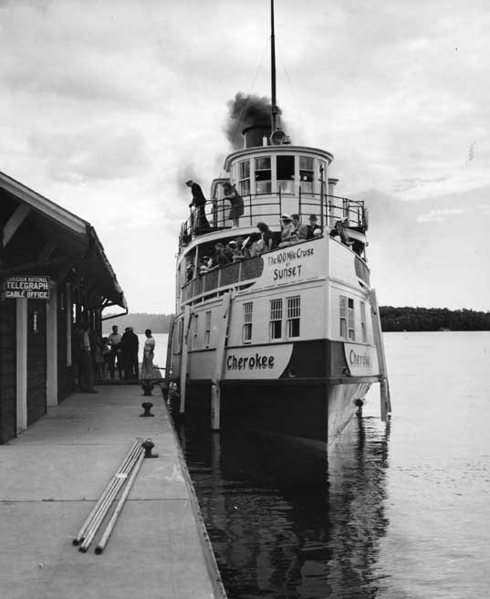 Passengers disembarking the Cherokee at the dock, Muskoka Lakes