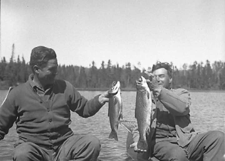 Guides holding their 5 ¼ lb and 4 lb trout caught in Bird Lake