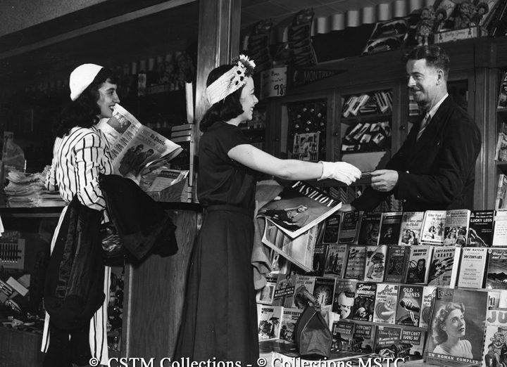 Purchasing magazines at newsstand inside Central Station