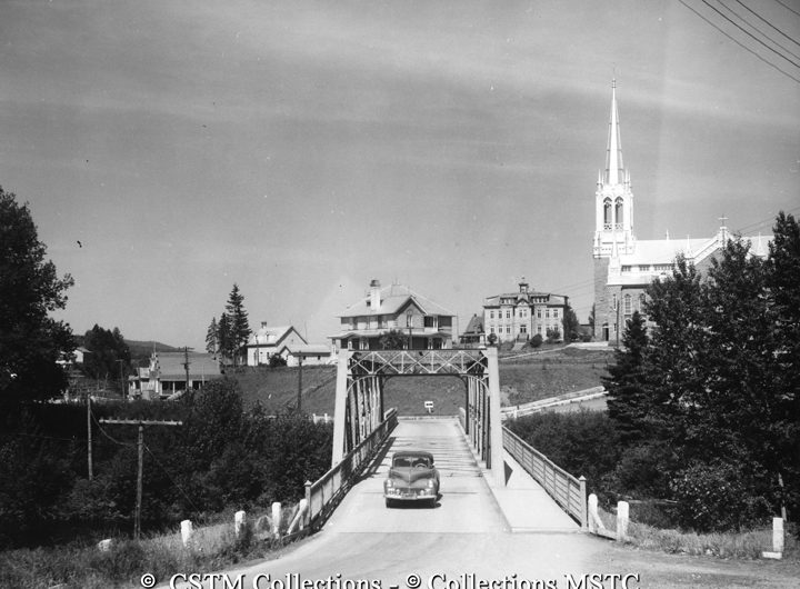 Car driving over a bridge in Causapscal, Quebec