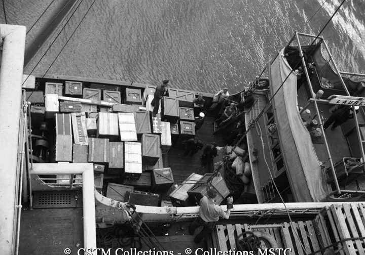 Unloading supplies onboard the Lady Rodney