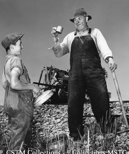 John MacDonald receiving a much needed drink from water boy Redolf Reche