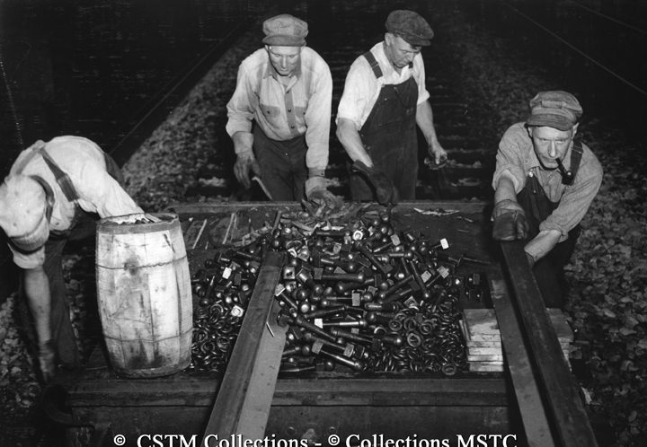 The material gang, G. Howard, H. Struthers, E. Baker and N. Young, with bolts, washers and other necessities