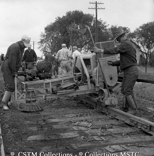 Relaying damaged track at Dauphin, Manitoba