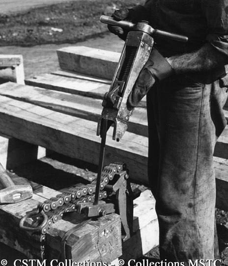 Method to hoop wood cross ties at the Wood Preservation Industries Ltd.
