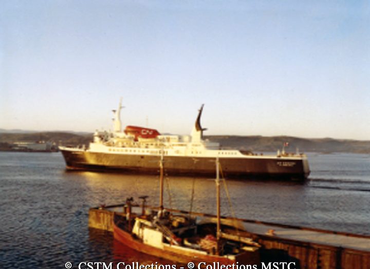 MV Leif Eiriksson entering Port aux Basques, Newfoundland with fishing boats in foreground