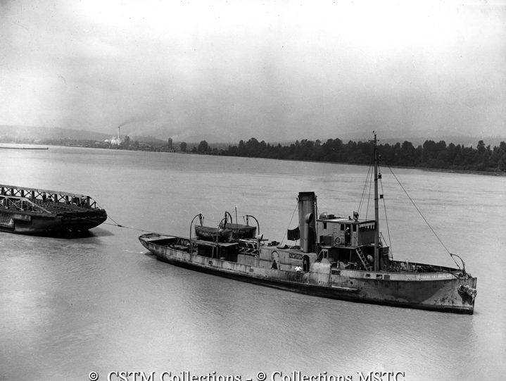 C.N. freight car barge and C.N. tug No. 1 shown on Fraser River leaving Port Mann