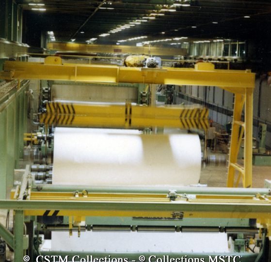 Sheets of paper being rolled at the Gaspesia Paper Mill
