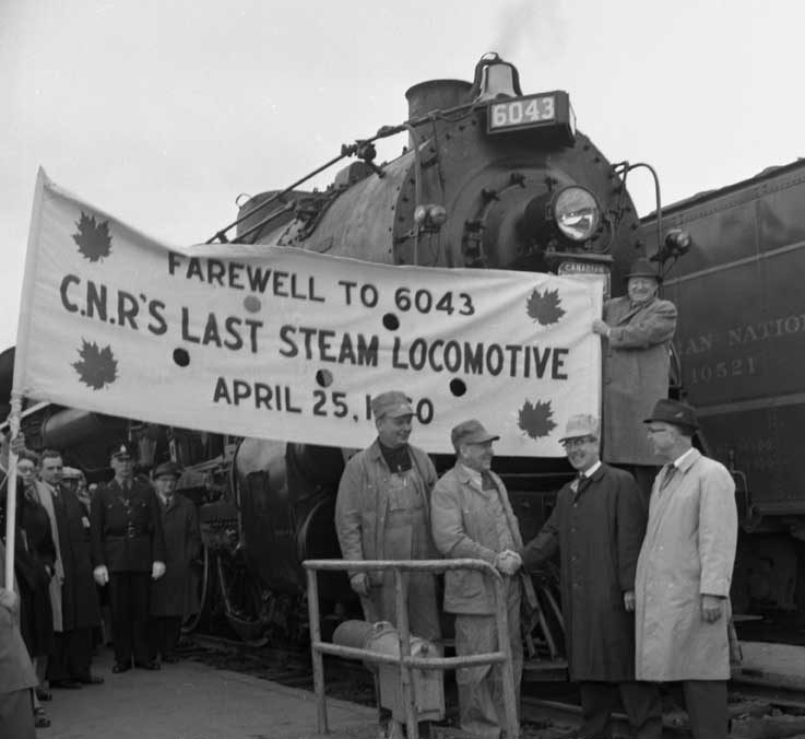 CN officials and the press greet CN's last scheduled steam train at Winnipeg