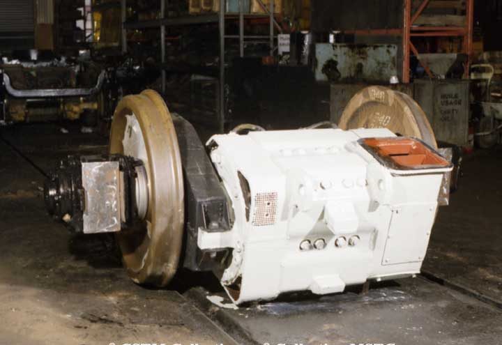 A traction motor mounted on a diesel locomotive axle