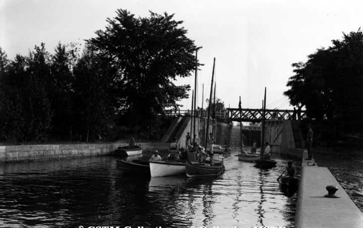 Sailboat passing through the Buckhorn Dam, Kawartha Lakes, Ont