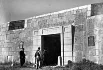 Tourists on a H.B. Railway excursion examining a rebuilt section Fort Prince of Wales