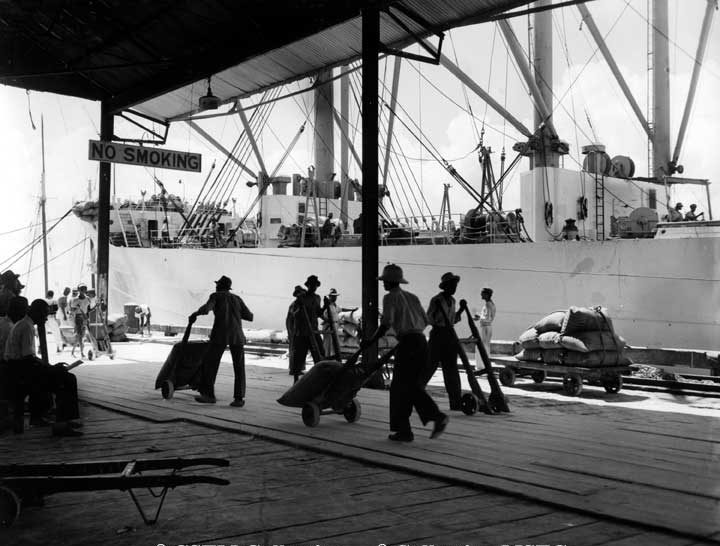 Loading sugar onto the C.N.S.S. Canadian Constructor at Georgetown, B.G