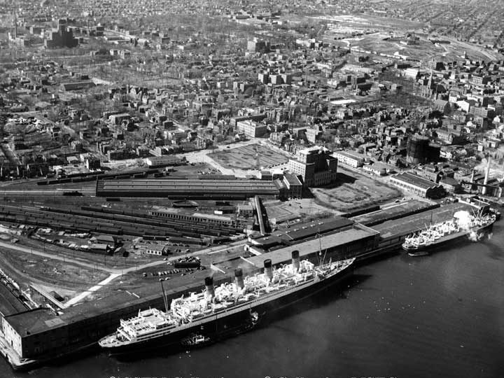 Aerial view of Halifax, including the S.S. Aquitania docked at Pier 21
