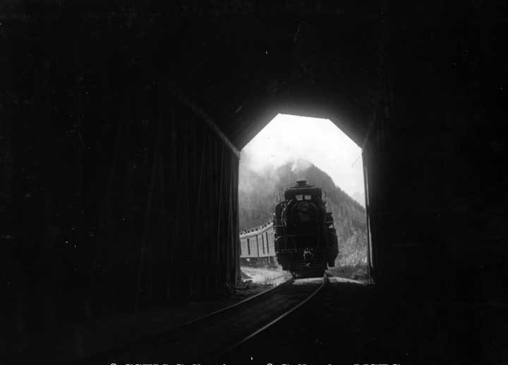 Continental Ltd. entering tunnel near Mt. Robson, B.C.