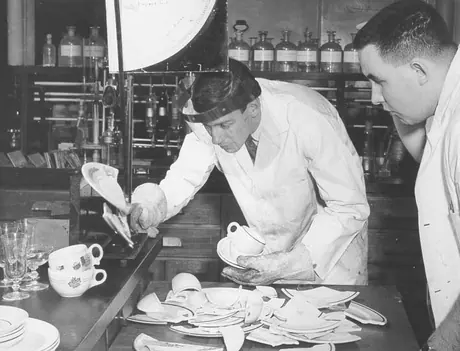 Technicians measuring breaking force for dinner plates