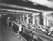 Examining coal in main entry of Elgin Mine