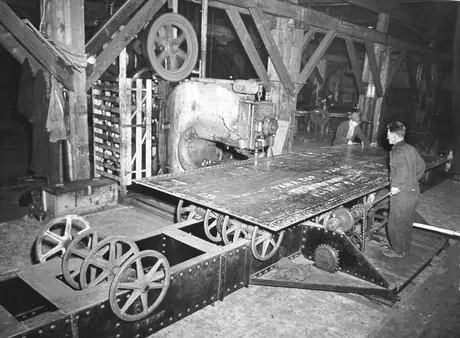 Prince Rupert shipyard : mammoth punch press punching steel plate for cargo vessel