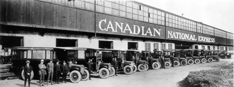 Canadian National Express truck fleet with drivers