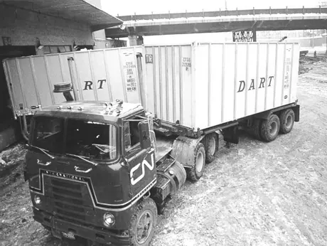 Truck transporting container