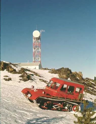 Snotrac in front of microwave relay station