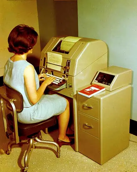 Telex operator types message on teleprinter