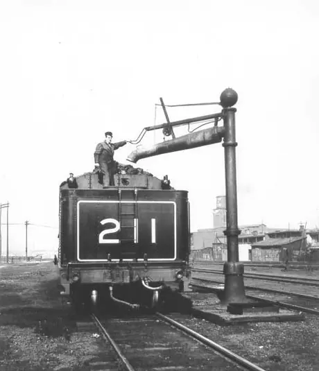 Filling Grand Trunk Locomotive 211 tender with water from a standpipe