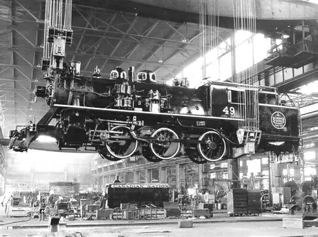 Steam locomotive no. 49 on overhead crane, Pointe-Saint-Charles shops